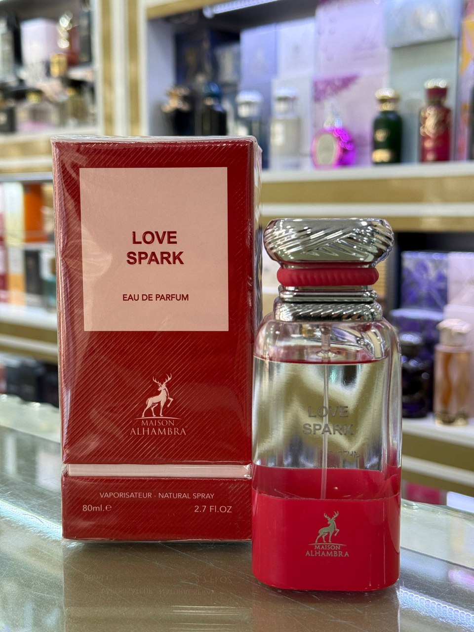 عطر ادوپرفیوم الحمبرا مدل لاو اسپارک رایحه شیرین و گرم مشابه تام فورد لاست چری